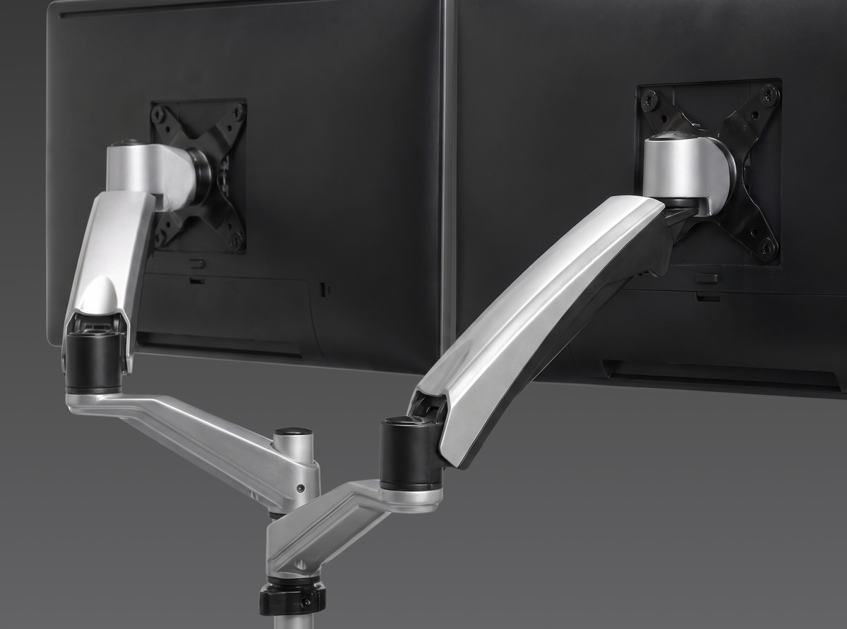 Each arm adjusts on its own, so two different monitors meet at one eye line.